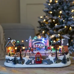 Kerstdorp Schaatsbaan | 8 Bewegende Schaatsers | Led-verlichting | Muziek | 42cm Breed